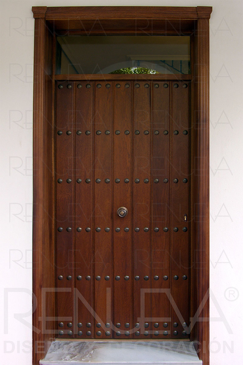 Puerta de entrada rústica cara exterior